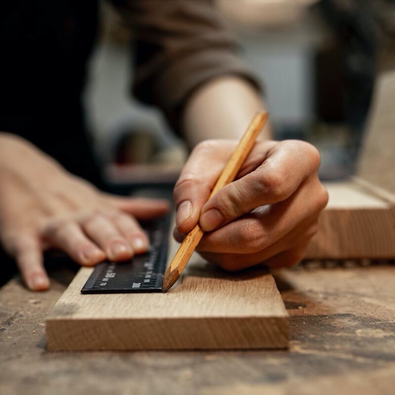 female-carpenter-working-studio-with-pencil